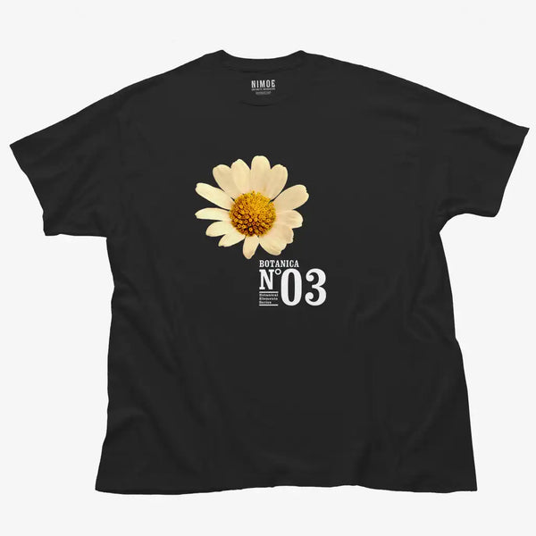 Botanica N.03 unisex classic t-shirt in black color displaying chamomile (matricaria chamomilla), flower.